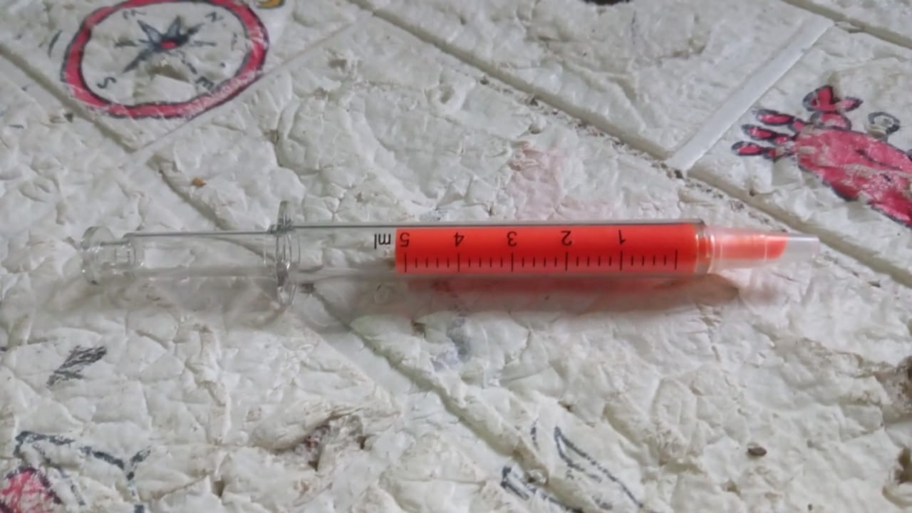 Creative fluorescent highlighter pen in orange color with a clear body for precise marking