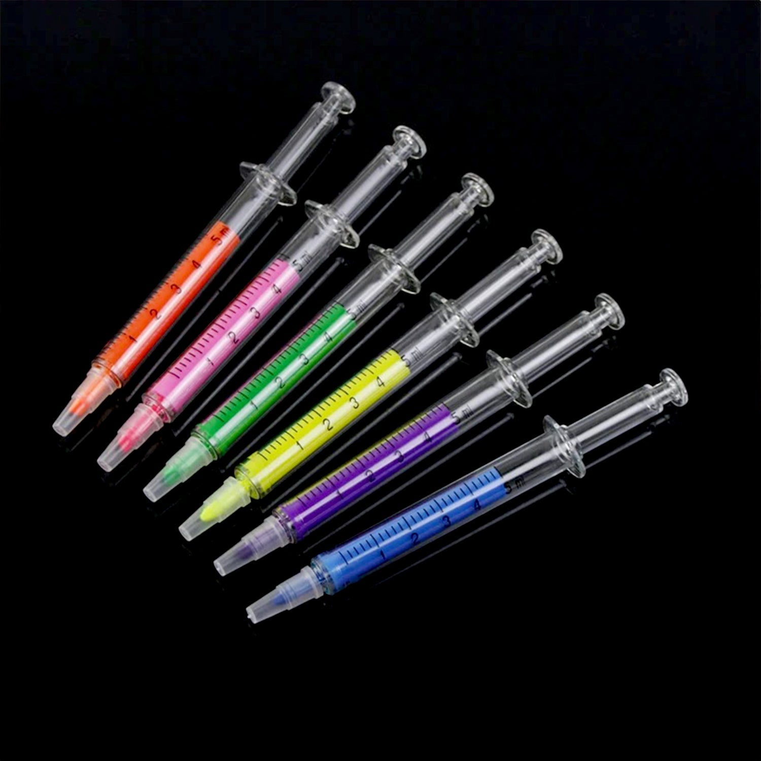 Set of six creative fluorescent highlighter pens in vibrant colors for office use and note-taking