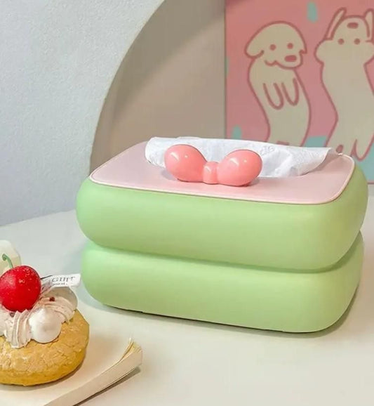 Creative square tissue box holder in green and pink with a unique design and soft curves