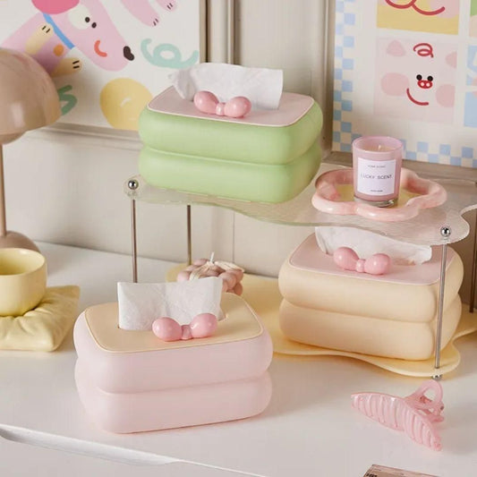 Creative square tissue box holder in pastel colors displayed on a stylish desk for home decor