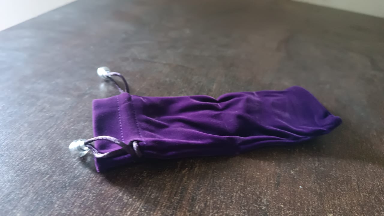 Small fancy return gift bags in purple velvet, perfect for special occasions and parties