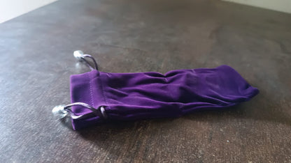 Small fancy return gift bags in purple velvet, perfect for special occasions and parties