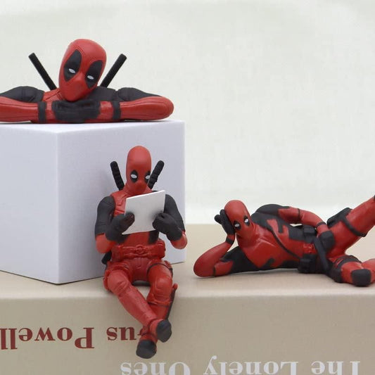 Set of Deadpool action figures gift featuring different poses and playful expressions for collectors