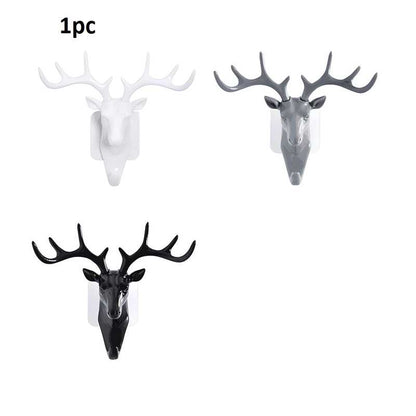 The Gir Farmer self adhesive coat hook in white gray and black deer head designs for wall mounting