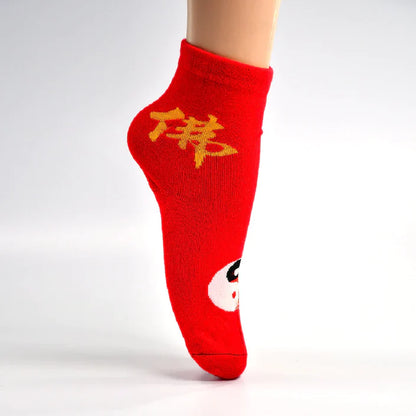 Red designer socks for women featuring playful graphic designs and comfortable fit