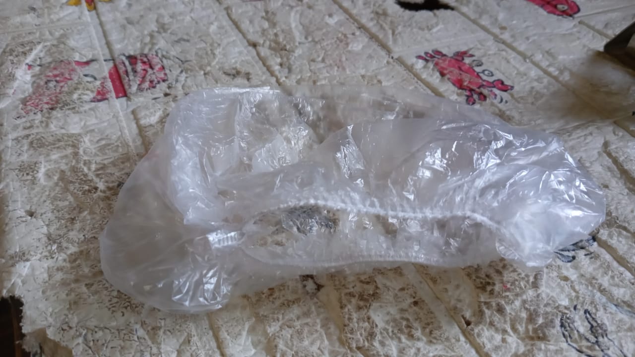 Clear disposable shower caps for women designed to protect hair during bathing