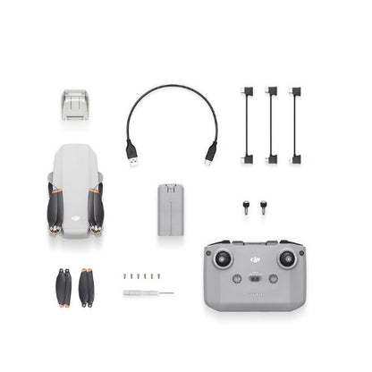 DJI Mini 2 SE Drone and accessories including remote, battery, and cables for enhanced aerial photography