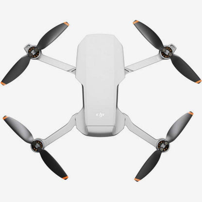 DJI Mini 2 SE Drone in sleek white design with black propellers for aerial photography