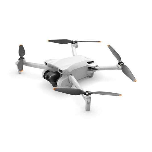 DJI Mini 3 Fly More Combo drone with four propellers and sleek design for aerial photography
