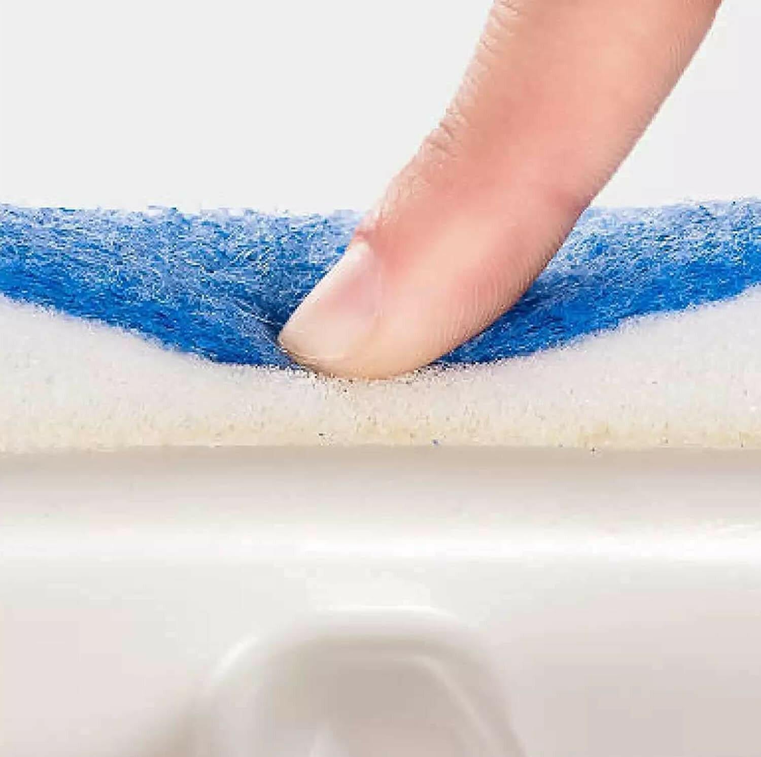 Hands using a double sided glass wiper for effective cleaning on a smooth surface