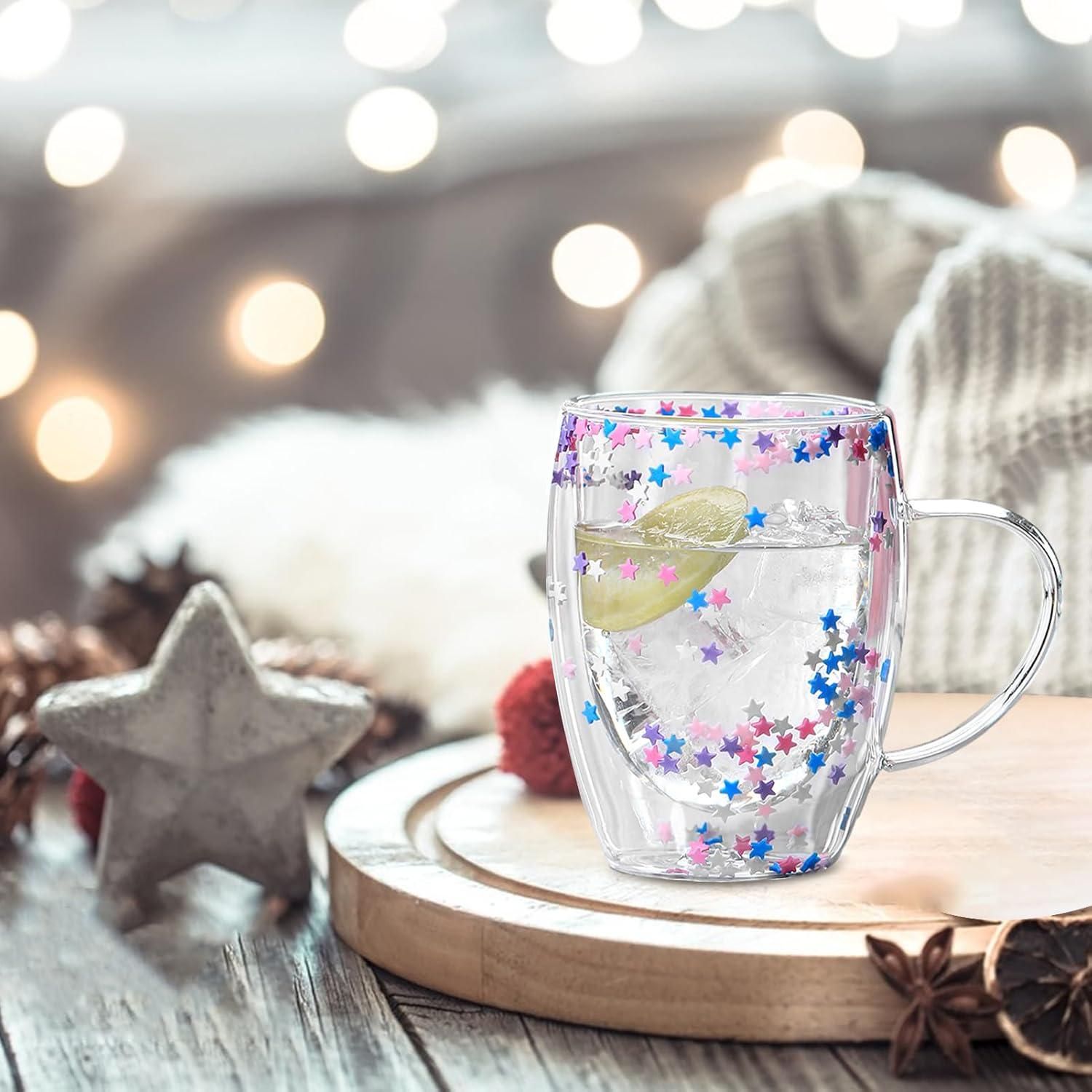THE GIR FARMER double walled glass coffee mug with colorful star confetti design filled with ice and lime