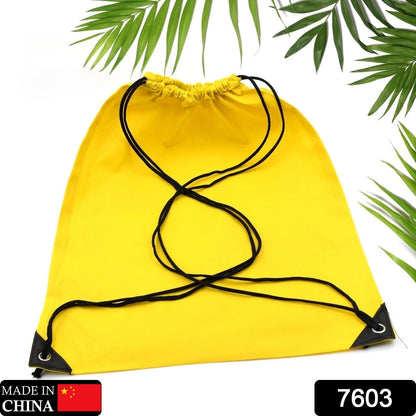 Bright yellow drawstring sport bag for gym with adjustable cords and durable design