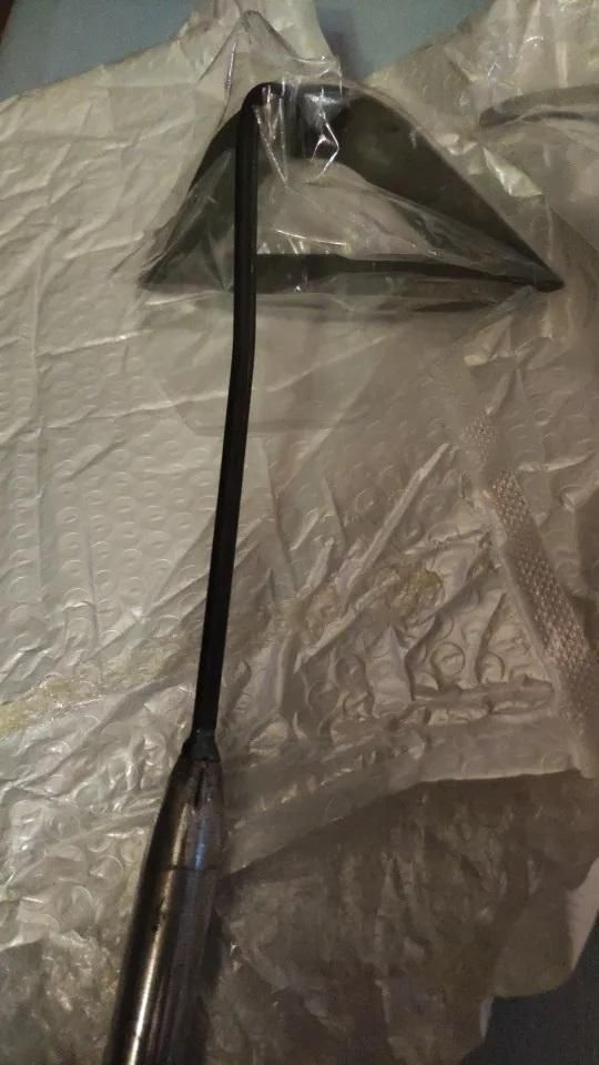 Durable manual weed puller with a sturdy metal head and ergonomic handle for easy weeding