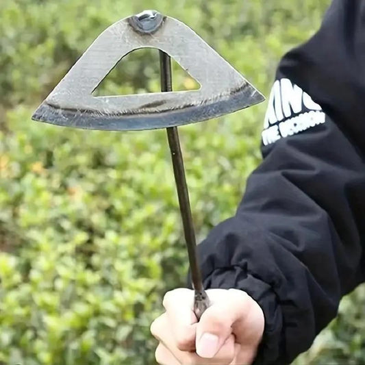 Durable manual weed puller tool being held, designed for effective weed removal in gardens