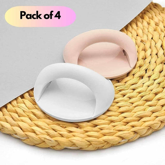 Pack of 4 white and pink round adhesive handles for cabinets with easy pull loop set on woven placemat
