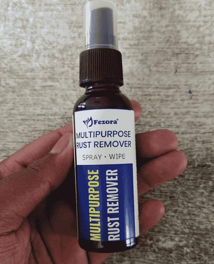 Fezora multipurpose rust remover spray bottle labeled as best rust remover for home use held in hand