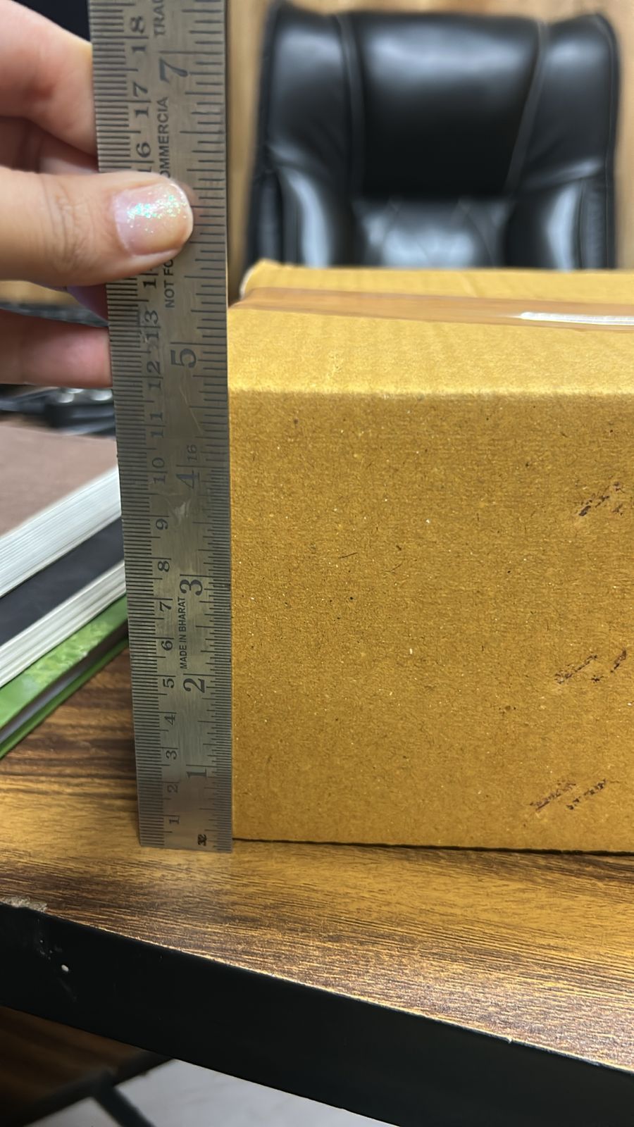 Druvan Enterprise Garden Weeding Tool in a brown box, measuring with a ruler for precise dimensions