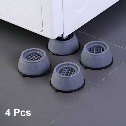 Set of four gray anti vibration pads for washing machine under appliance legs on gray floor