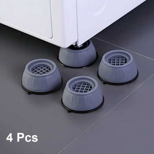 Set of four gray anti vibration pads for washing machine under appliance legs on gray floor