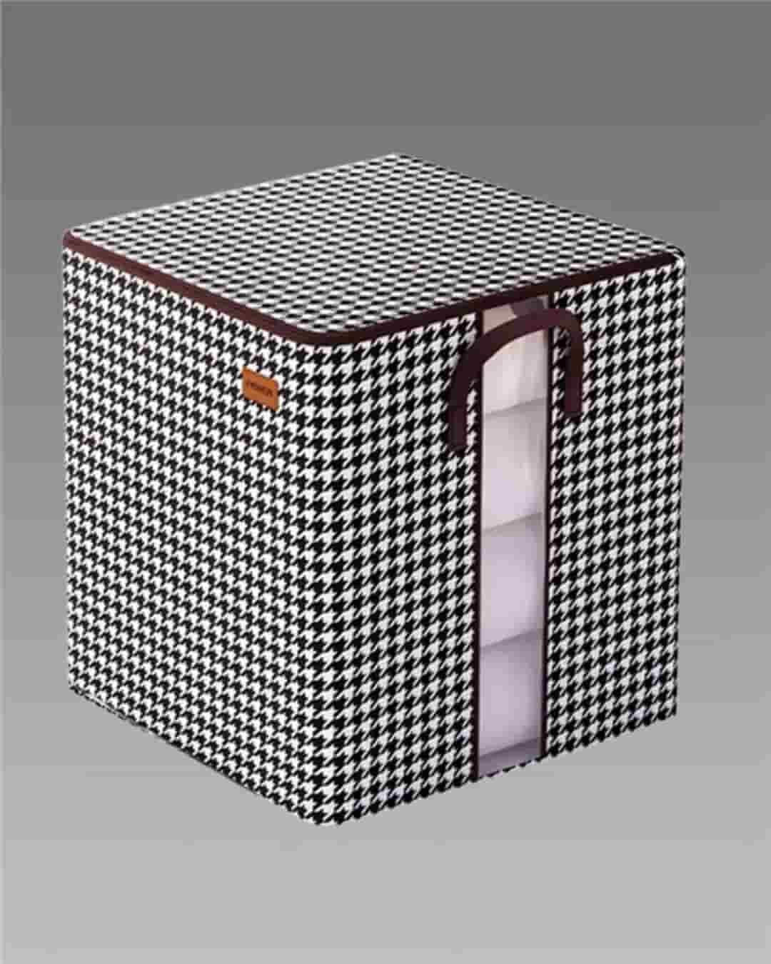 Portable laundry storage box with black and white houndstooth pattern and zipper opening