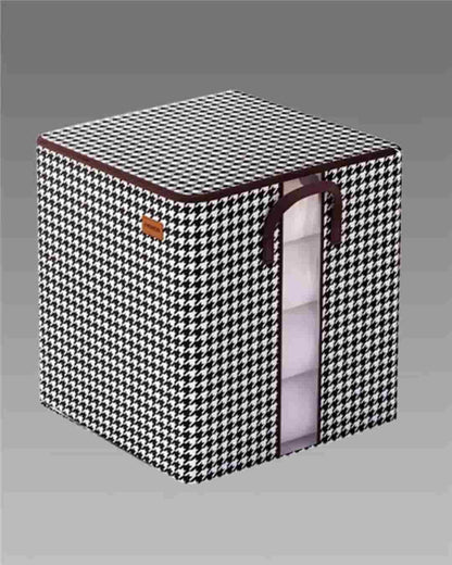 Portable laundry storage box with black and white houndstooth pattern and zipper opening