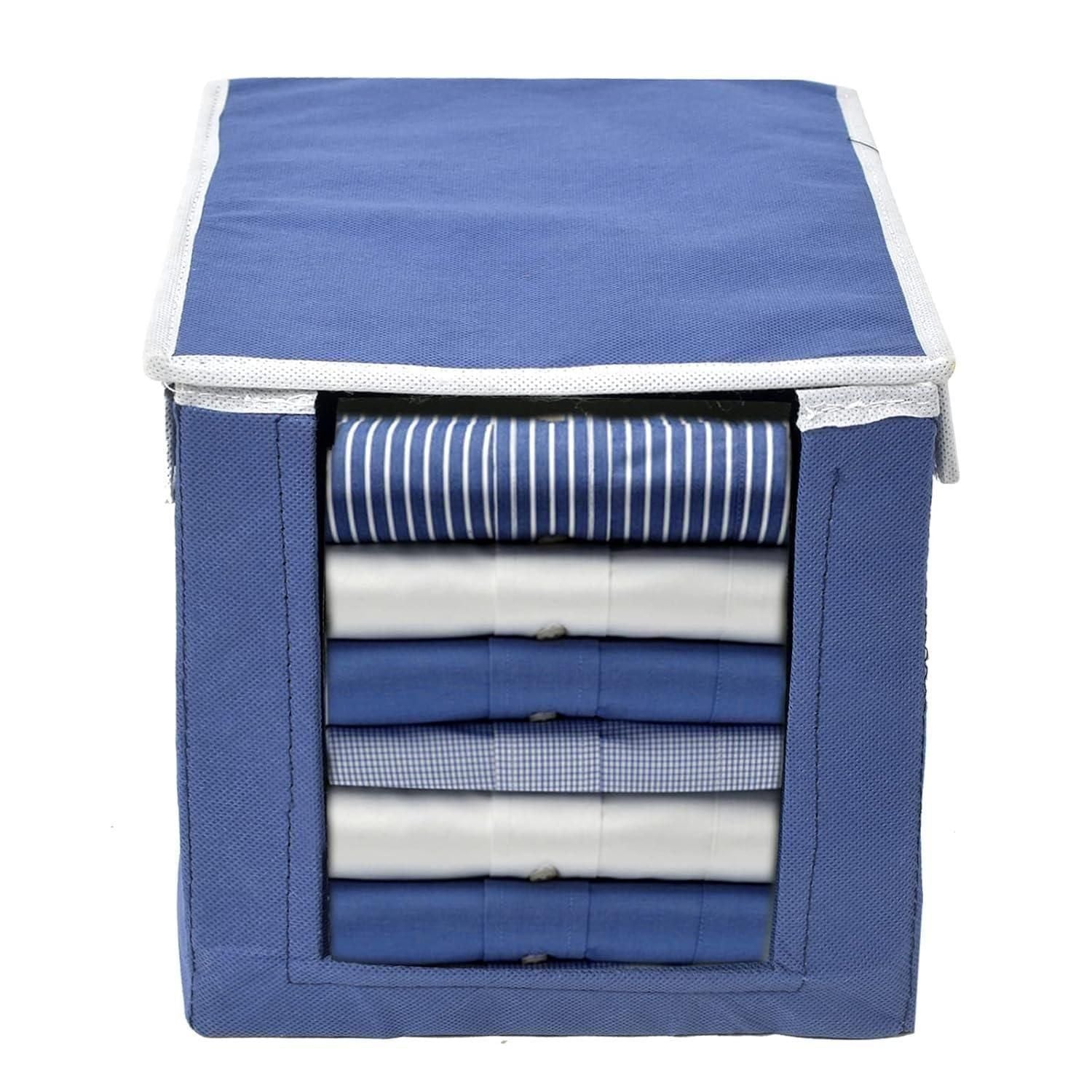 Blue shirts and clothing organizer for wardrobe with folded shirts neatly stored inside
