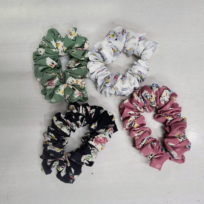 Set of four gentle elastic hair rope for women in green white black and pink floral patterns