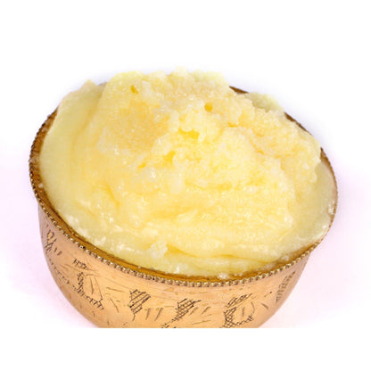 Creamy yellow ghee organic in a decorative bowl, perfect for cooking and spreading
