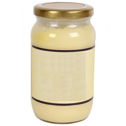 The GIR FARMER ghee organic in a glass jar, perfect for cooking and adding flavor to dishes