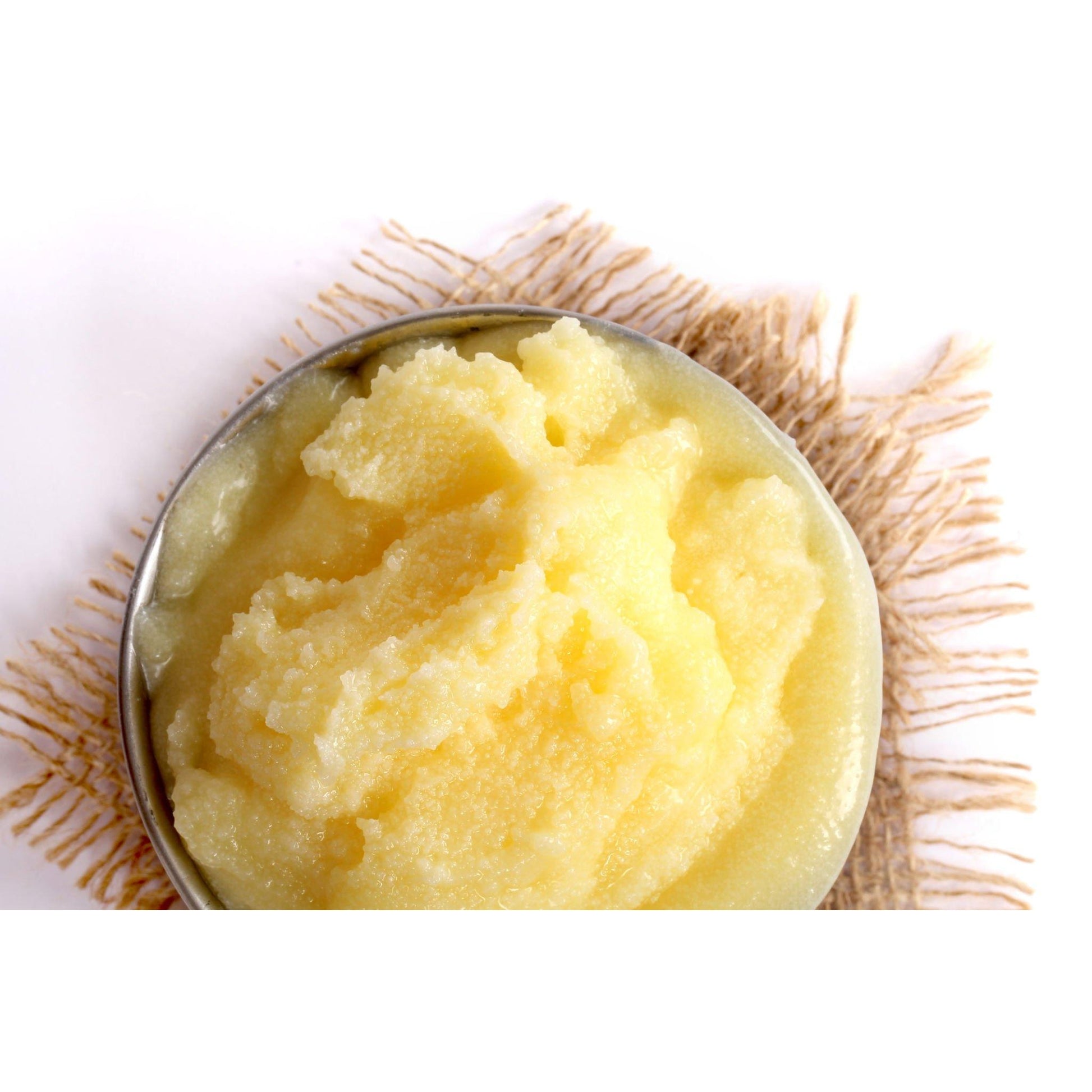 Creamy yellow ghee organic in a bowl, perfect for cooking and adding flavor to dishes