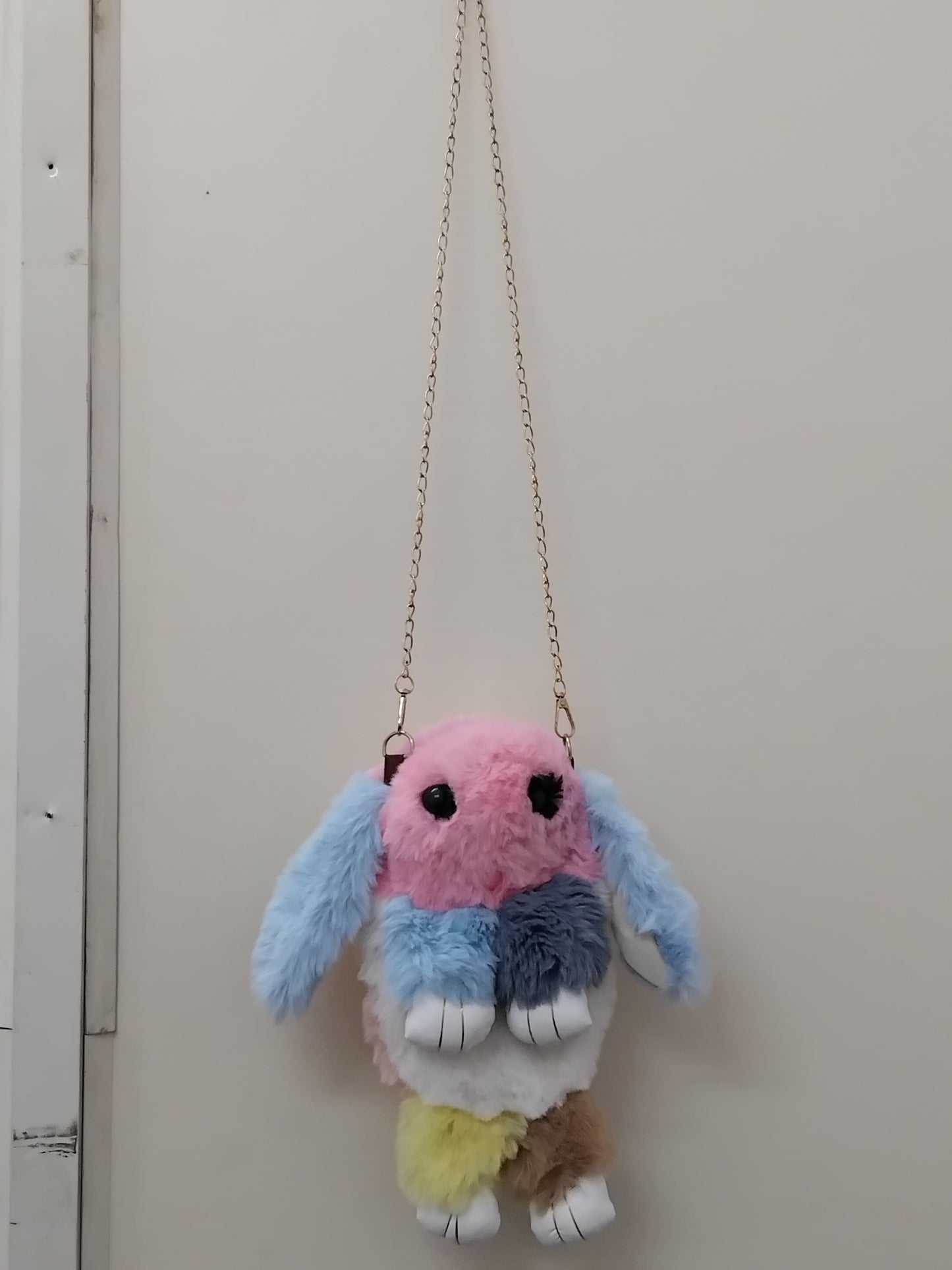 Girls bunny shaped sling bag with chain in pastel colors and fluffy texture