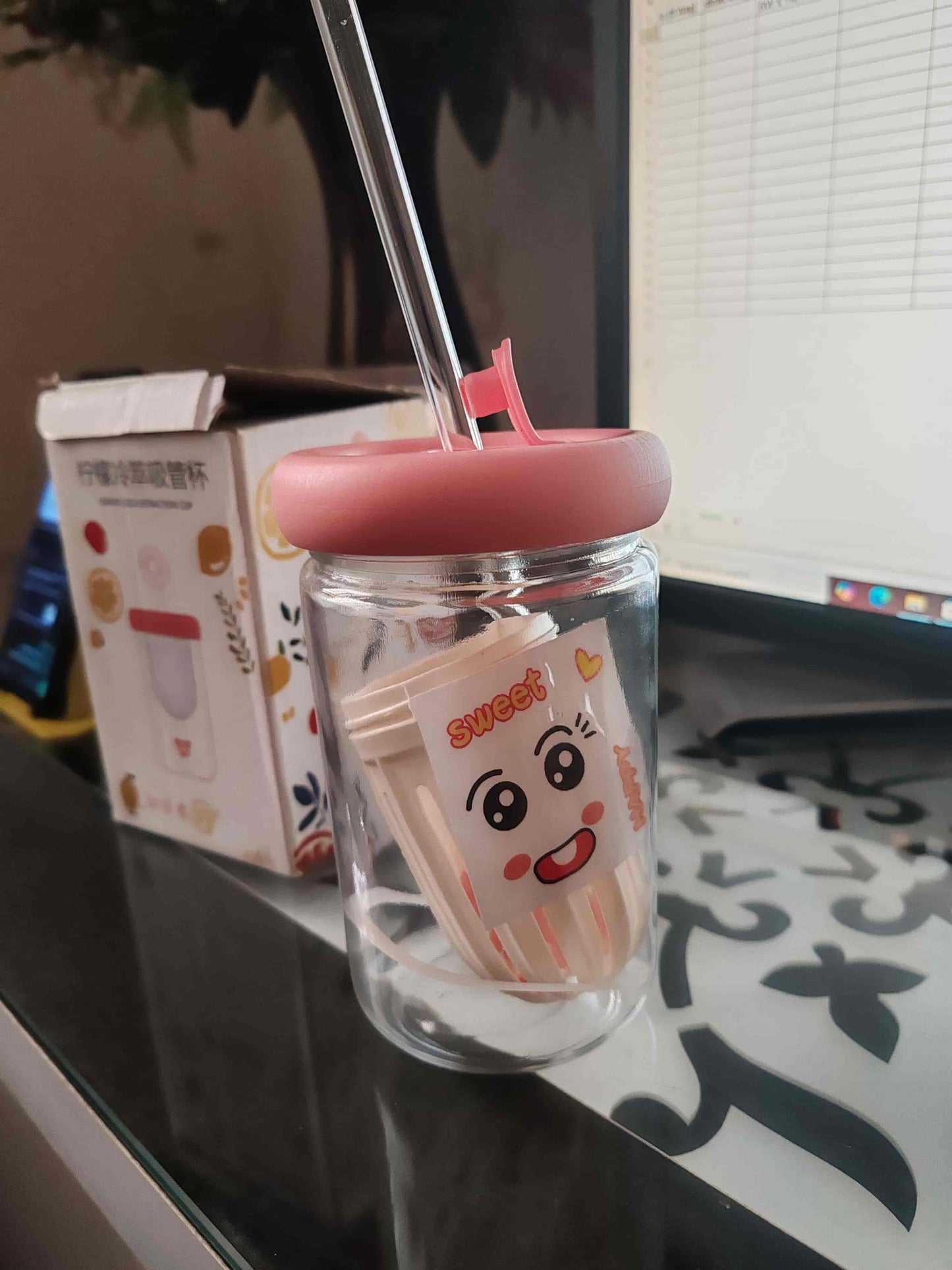 THE GIR FARMER glass smoothie tumbler with lid in pink featuring a clear straw and cute cartoon design