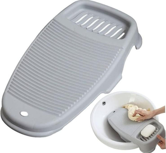 Gray soap storage washboard for laundry with ridged surface and built-in soap holder