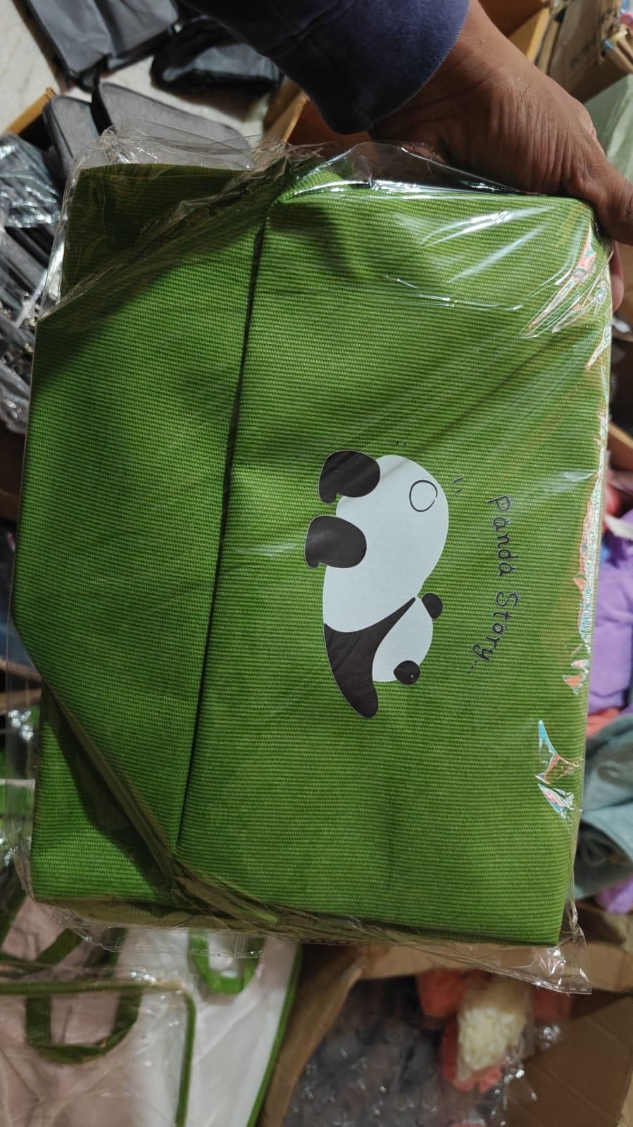Green panda themed storage organizer with panda graphic and text on fabric by The Gir Farmer