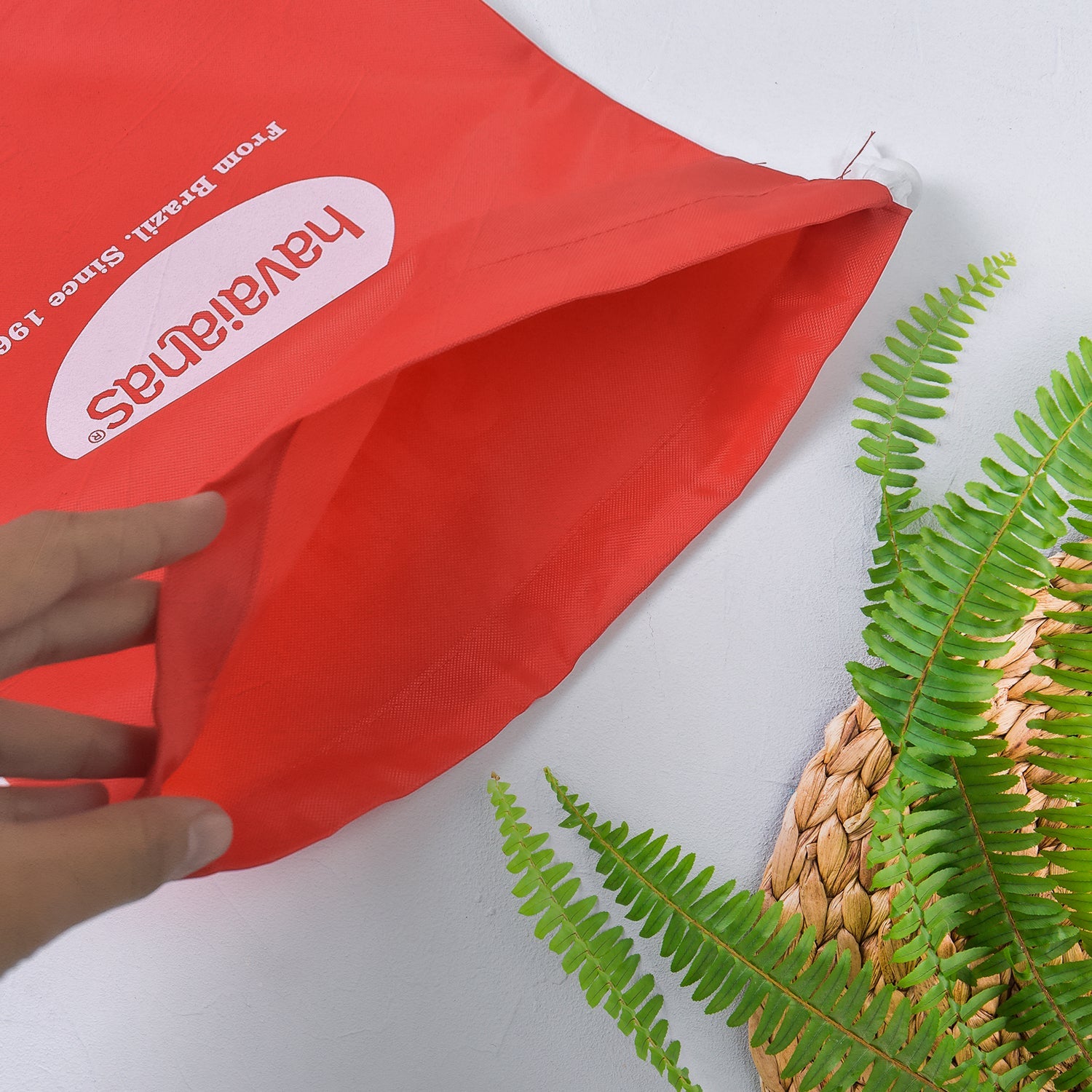 Heavy duty drawstring bag in bright red with durable design for home improvement and organization