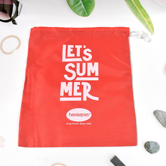 Bright red heavy duty drawstring bag with summer slogan for versatile storage and transport