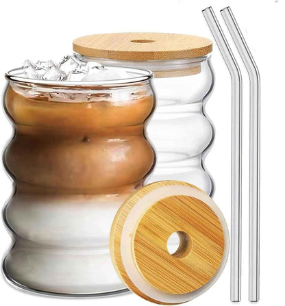 Two double wall wave shape glass with wood cap tumblers with bamboo lids and two reusable glass straws