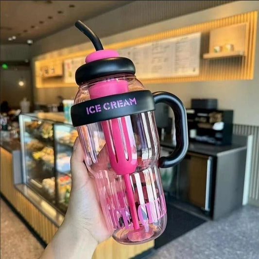 The Gir Farmer BPA free straw water bottle in pink and black with ice cream text and handle