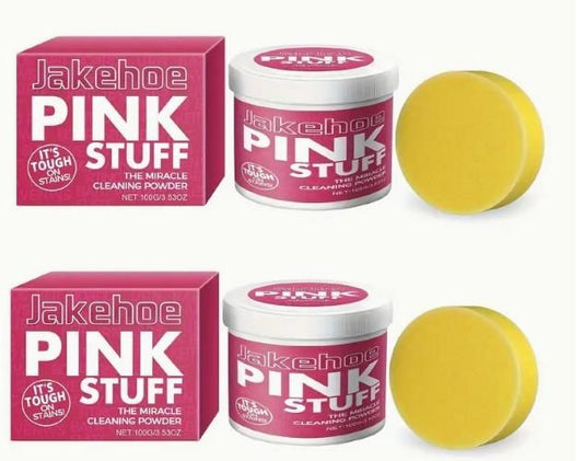 Jakehoe Pink Stuff tough stain remover powder with two pink tubs and yellow scrubbing sponges