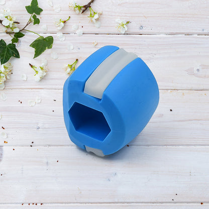 Your Brand jaw sculpting tool in blue silicone, designed for enhancing jawline aesthetics