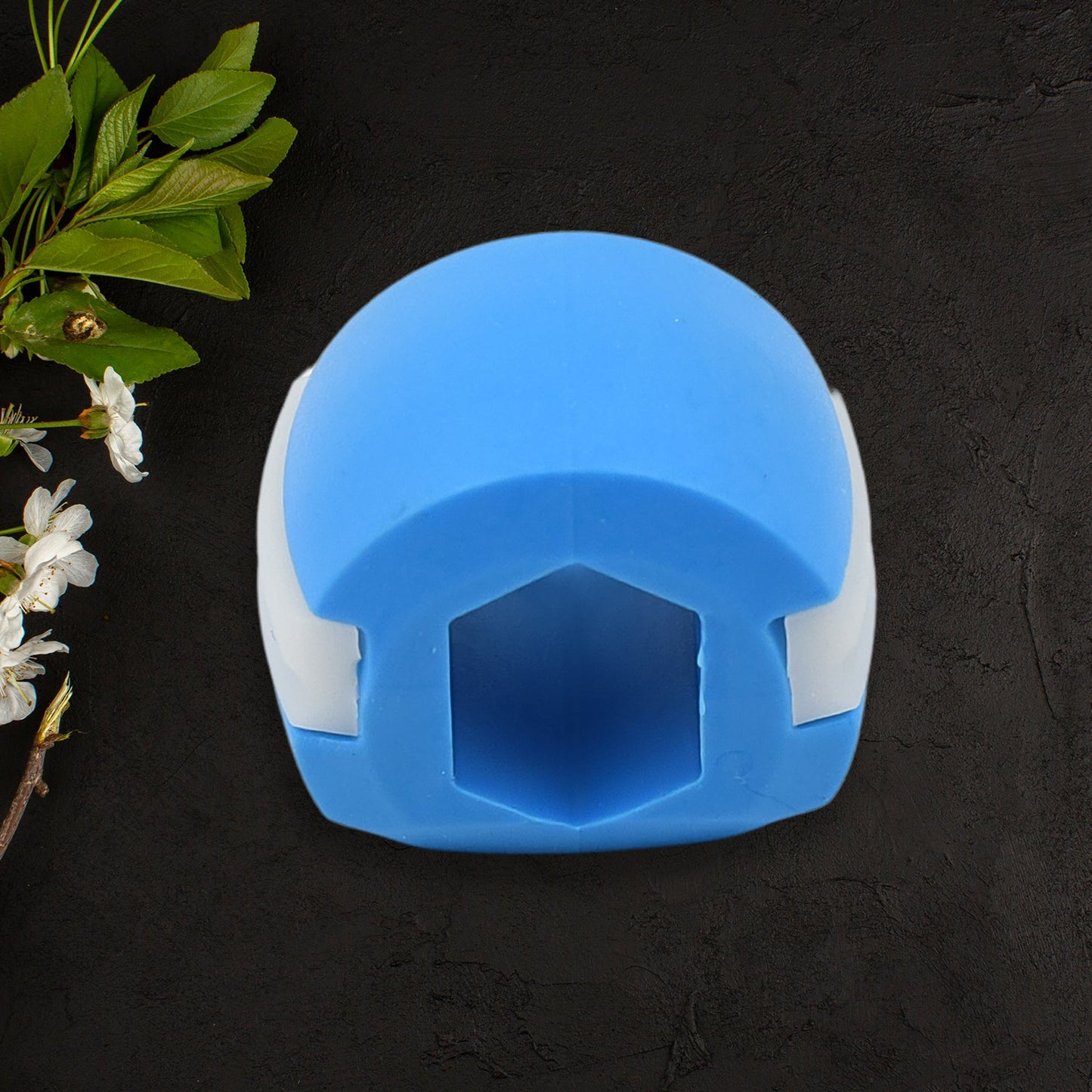 Your Brand jaw sculpting tool in blue for facial contouring and enhancing jawline definition
