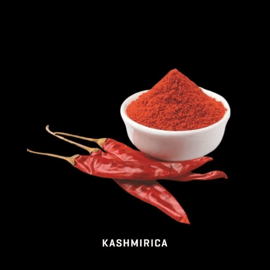 Organic red chilli powder in white bowl with dried red chillies on black background by THE GIR FARMER
