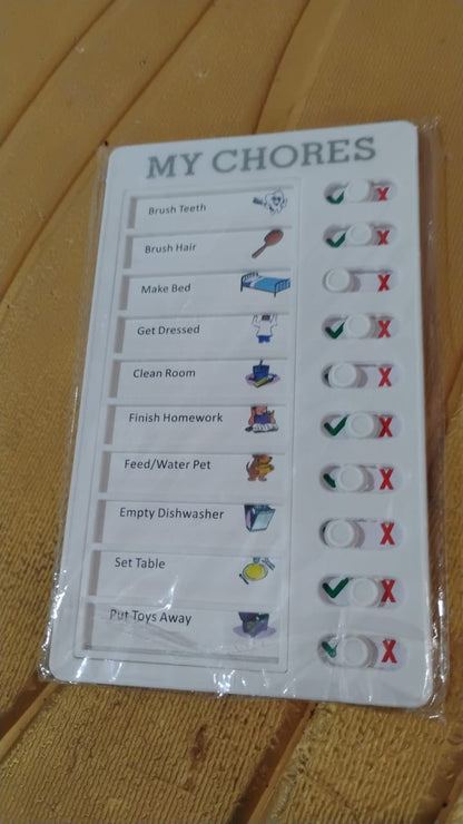 Kids chore chart board with interactive checklist for organizing daily tasks and responsibilities.