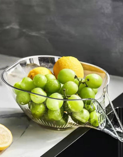 Stylish kitchen sink drain basket with green grapes and lemons for fruit storage