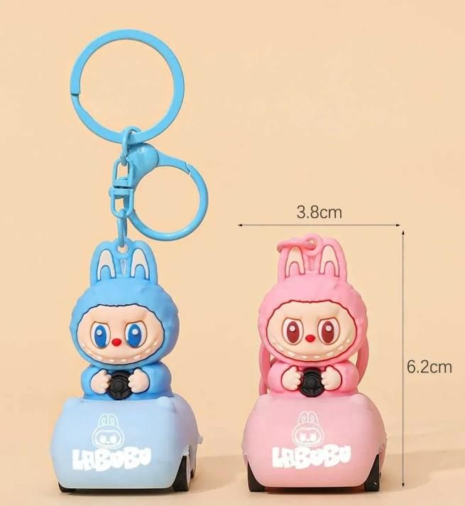 Labubu car keychain featuring blue and pink bunny characters on miniature cars