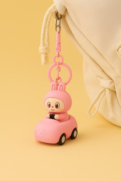 Labubu car keychain in pink featuring a cute bunny character driving a mini car