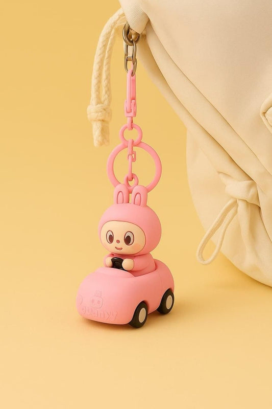 Labubu car keychain in pink featuring a cute bunny character driving a mini car