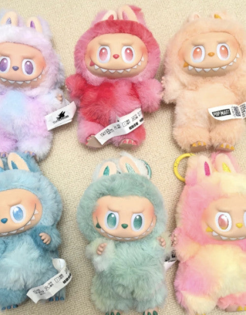 Colorful Labubu Doll plush toys from The Gir Farmer in various pastel shades for kids