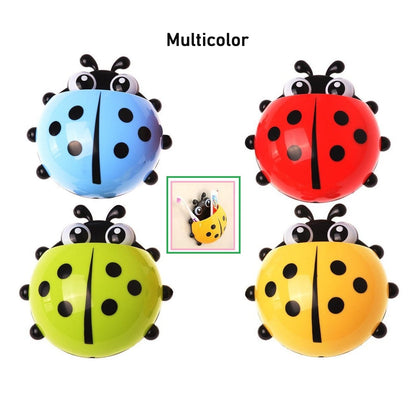 Colorful ladybug toothbrush holder available in blue, red, green, and yellow for kids' bathrooms