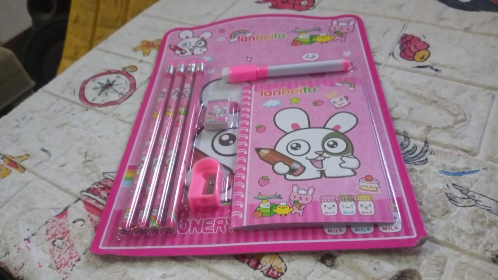 Kids stationery kit with diary featuring cute animal designs and colorful pens and accessories